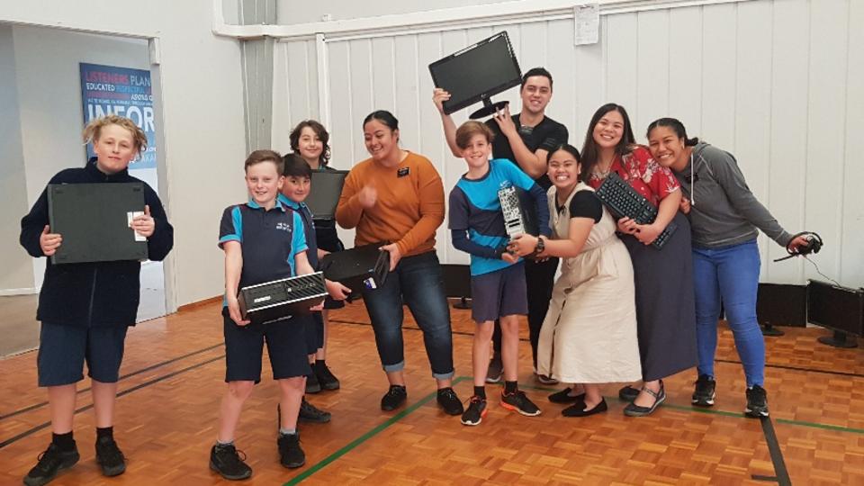 Missionaries and Students in New Zealand Donate Computers to Tonga