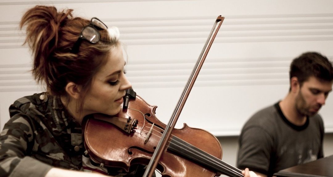LDS YouTuber Lindsey Stirling Performs “The Arena” In The Strings Magazine